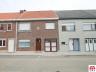 Te moderniseren woning met 4 slaapkamers op een perceel van 387m². De goede ligging met vlotte toega
